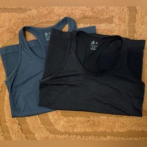Two Reebok- medium maternity workout tanks